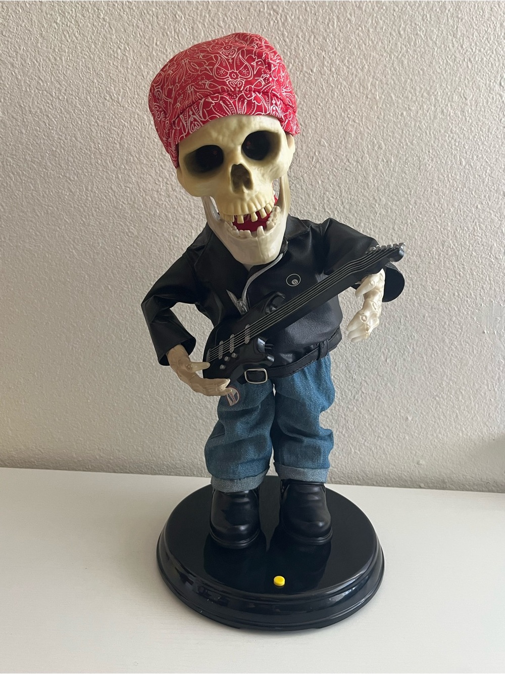 Skeleton Guitarist Décor with Red Bandana and Black Jacket